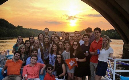 Group Of People On Our Boat With Gorgeous DC Sunset